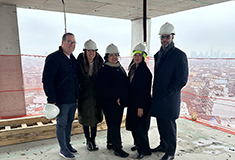 Standard and Ekstein Tolbert Development top off $76 million mixed-use development project